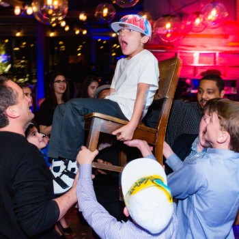 Bar mitzvah brother during hora