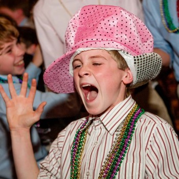 Mitzvah guest with hat and beads