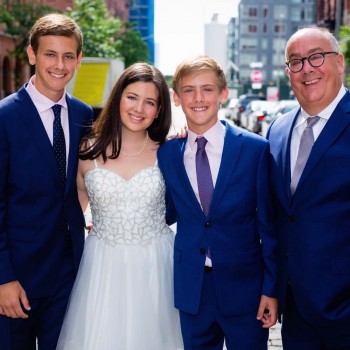 Bat mitzvah girl with the men in her life