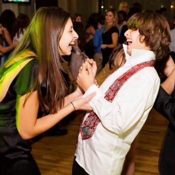Bar mitzvah boy and sister on the dance floor