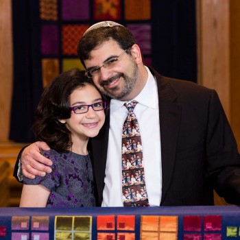 Father-daughter portrait smiling