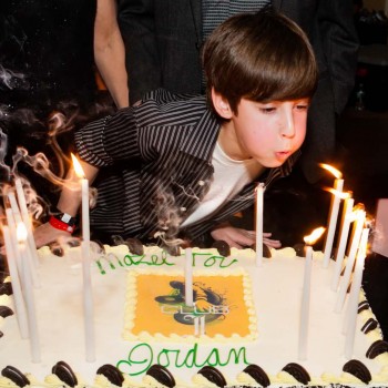 Blowing out bar mitzvah candles
