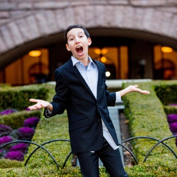 Bar mitzvah boy sings at Museum of Natural History
