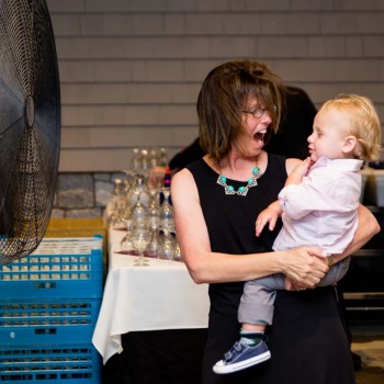 Cooling off in front of fan at bat mitzvah
