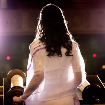 Bat mitzvah girl reads Torah