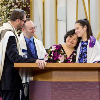 Beaming parents at bat mitzvah