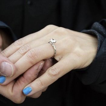 Admiring the engagement ring