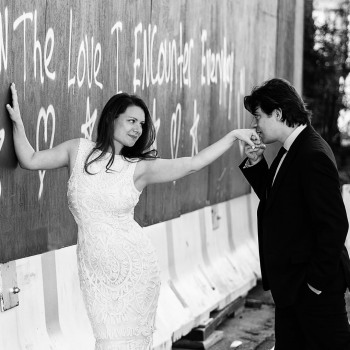 Engaged with graffiti backdrop