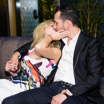 Kissing at their engagement party