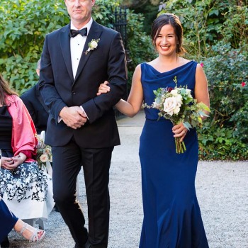Bridesmaid-and-groomsman-walk-the-aisle