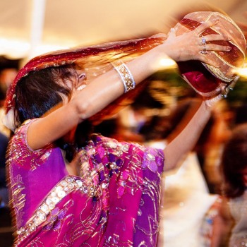 Indian bridesmaid performs traditional dance