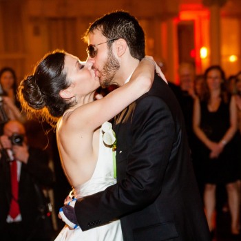 Bride and groom kiss during first dance