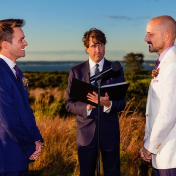 Grooms exchange wedding vows in Hamptons field