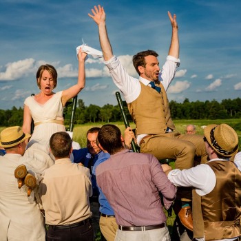The wedding hora in a beautiful field