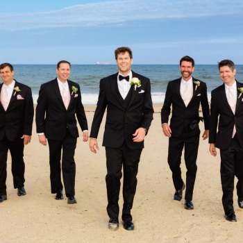 Groom and groomsmen on the beach
