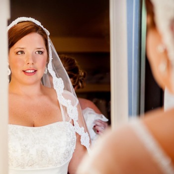 Bride takes a final look in the mirror