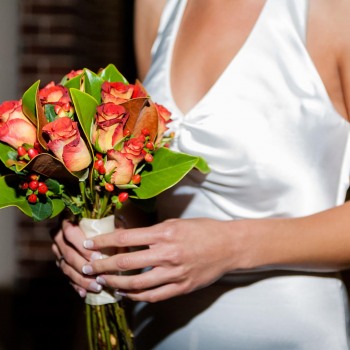 Bride carrying her beautiful bouquet