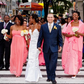 Wedding party walk up Fifth Ave NYC