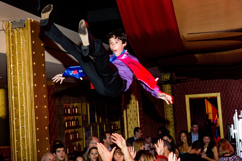 005-Bar-mitzvah-boy-tossed-high-during-horah
