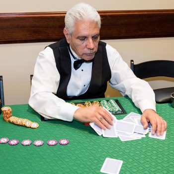 Zimner-Golf-Invitational-poker-dealer-shuffling